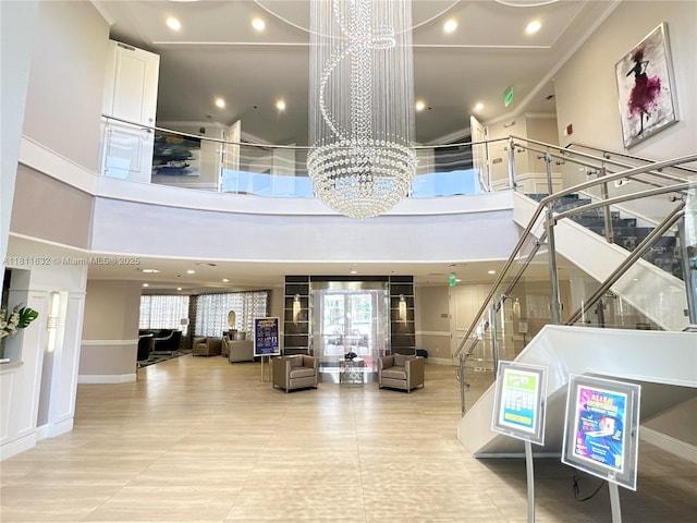 5154 Floria Dr Unit O, Boynton Beach, FL 33437 - building lobby with a high ceiling, stairs, and recessed lighting