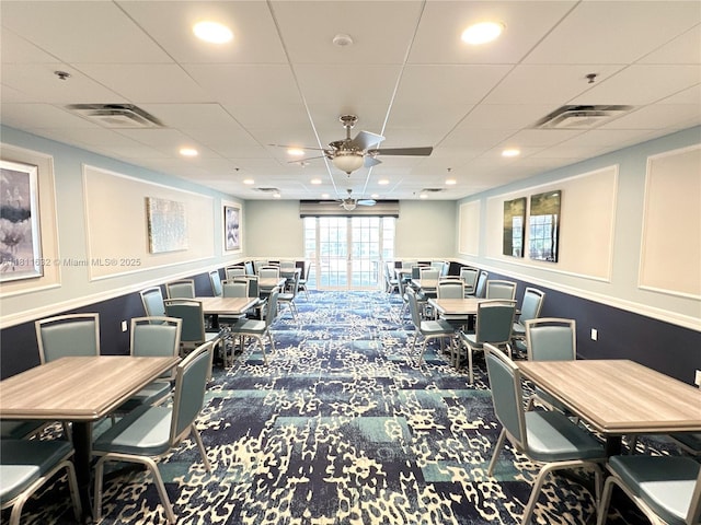 5154 Floria Dr Unit O, Boynton Beach, FL 33437 - dining area with a ceiling fan, carpet floors, and a drop ceiling