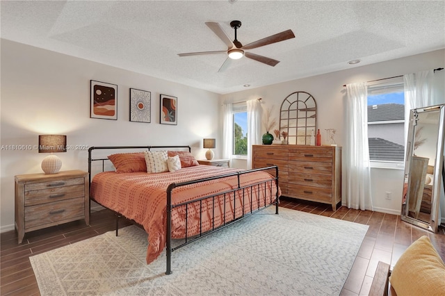 16222 NW 17th Ct, Pembroke Pines, FL 33028 - bedroom with a textured ceiling, multiple windows, wood tiled floors, and ceiling fan