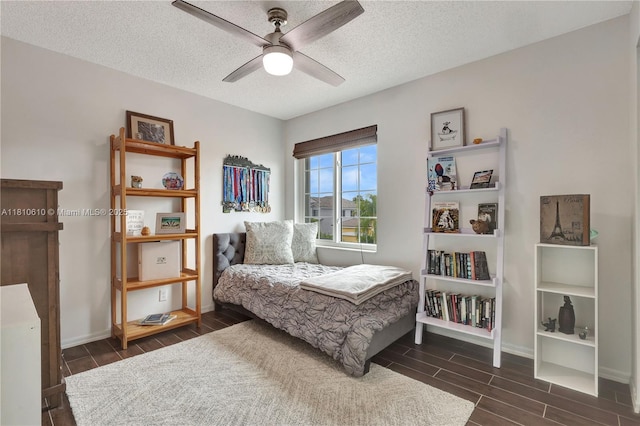 16222 NW 17th Ct, Pembroke Pines, FL 33028 - bedroom with wood finish floors, baseboards, a textured ceiling, and a ceiling fan