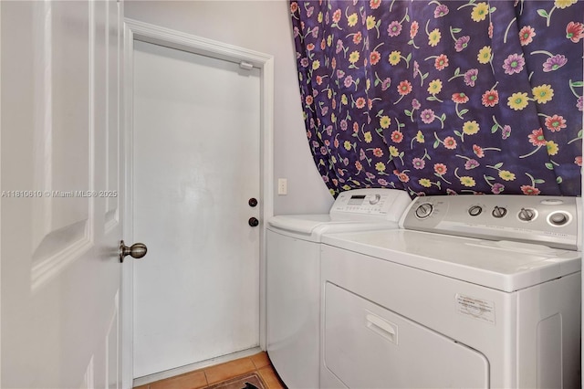 16222 NW 17th Ct, Pembroke Pines, FL 33028 - laundry room with washing machine and dryer and tile patterned flooring