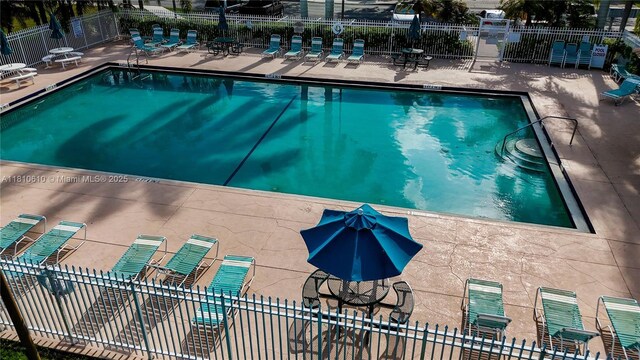 16222 NW 17th Ct, Pembroke Pines, FL 33028 - community pool with a patio area