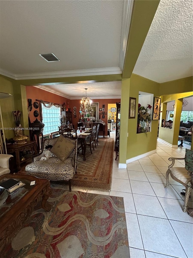 11920 SW 20th St, Miramar, FL 33025 - living area featuring a textured ceiling, a chandelier, light tile patterned flooring, crown molding, and baseboards