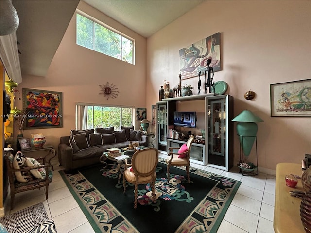 11920 SW 20th St, Miramar, FL 33025 - living area with light tile patterned flooring, healthy amount of natural light, and high vaulted ceiling