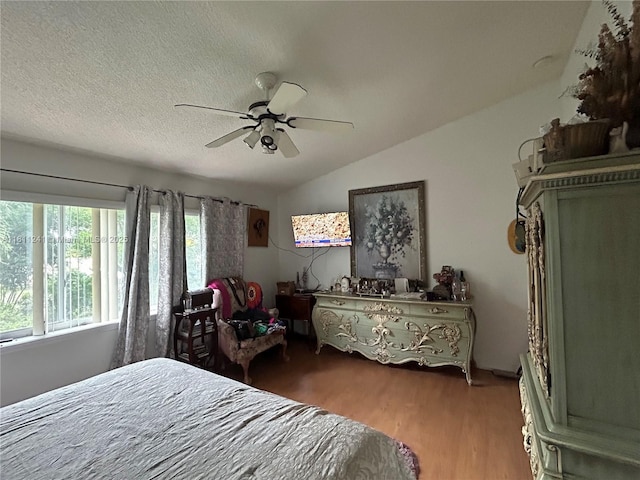 11920 SW 20th St, Miramar, FL 33025 - bedroom with wood finished floors, lofted ceiling, and a ceiling fan