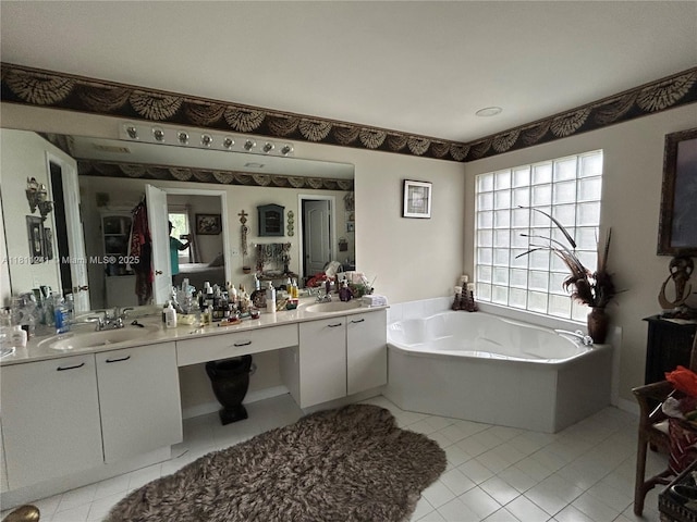 11920 SW 20th St, Miramar, FL 33025 - full bath featuring vanity, a bath, and tile patterned flooring