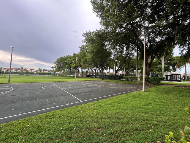 11920 SW 20th St, Miramar, FL 33025 - view of basketball court with a lawn and community basketball court