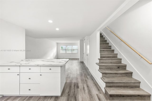 1461 NE 150th St Unit 103, Miami, FL 33161 - stairs with wood finished floors, recessed lighting, and baseboards