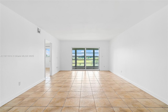 2500 SW 81st Ave Unit 402, Davie, FL 33324 - unfurnished room with light tile patterned floors and baseboards