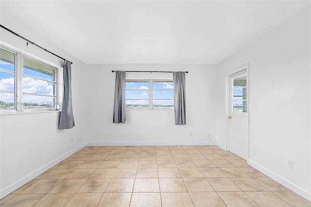 2500 SW 81st Ave Unit 402, Davie, FL 33324 - unfurnished room with baseboards and light tile patterned floors