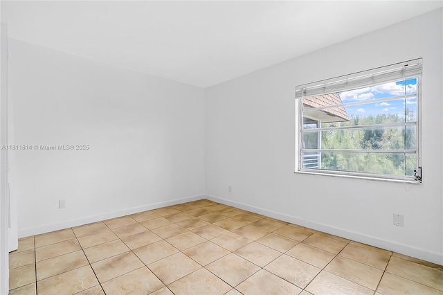 2500 SW 81st Ave Unit 402, Davie, FL 33324 - unfurnished room featuring light tile patterned floors and baseboards