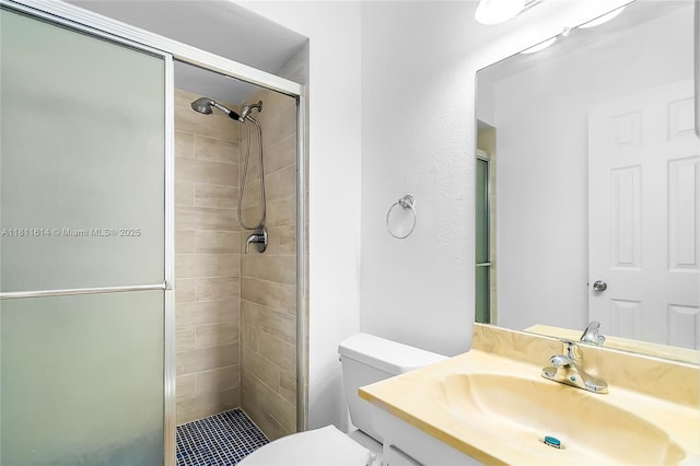 2500 SW 81st Ave Unit 402, Davie, FL 33324 - bathroom with a stall shower, toilet, and vanity