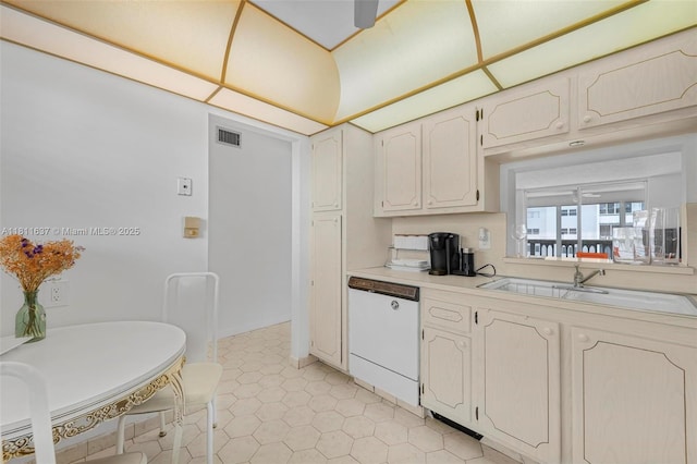 500 NE 12th Ave Unit 407, Hallandale Beach, FL 33009 - kitchen with dishwasher, light countertops, and a sink