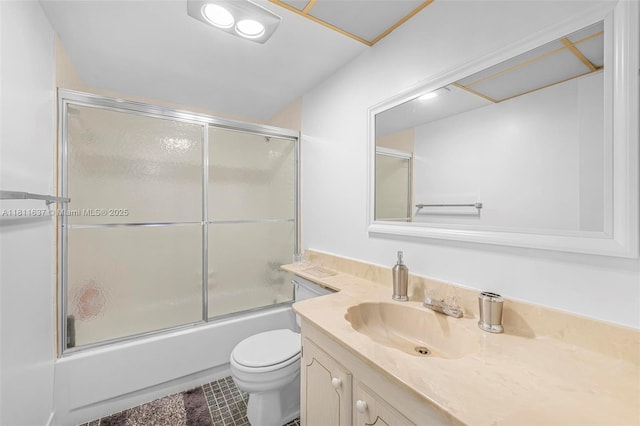 500 NE 12th Ave Unit 407, Hallandale Beach, FL 33009 - bathroom with vanity, toilet, bath / shower combo with glass door, and tile patterned floors