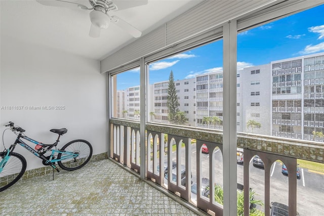 500 NE 12th Ave Unit 407, Hallandale Beach, FL 33009 - unfurnished sunroom featuring a ceiling fan