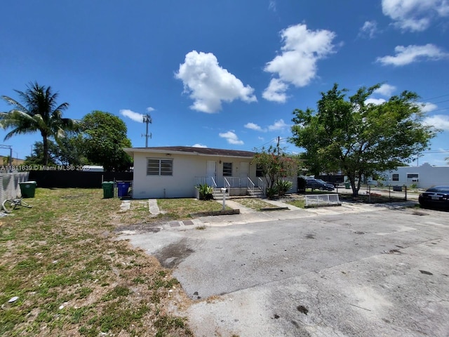 640-642 NW 77th St, Miami, FL 33150 - view of front facade with stucco siding