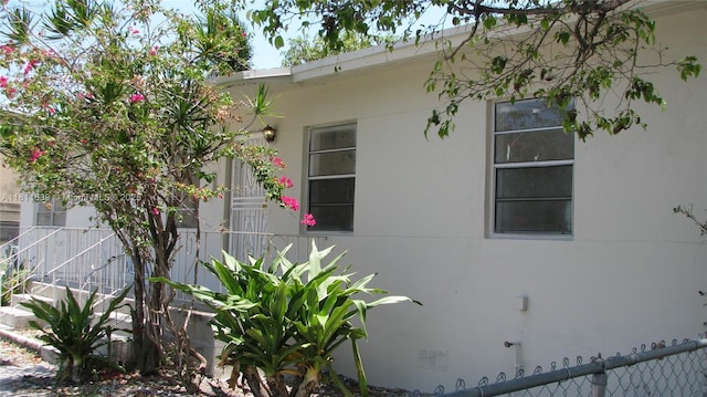 640-642 NW 77th St, Miami, FL 33150 - view of property exterior with stucco siding