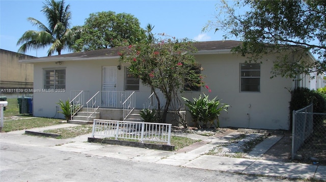640-642 NW 77th St, Miami, FL 33150 - view of front facade featuring stucco siding