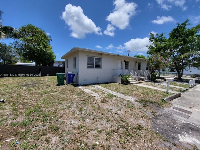 640-642 NW 77th St, Miami, FL 33150 - view of front of house featuring stucco siding