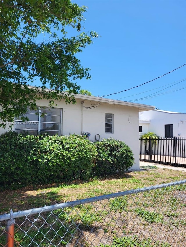 640-642 NW 77th St, Miami, FL 33150 - back of house featuring stucco siding