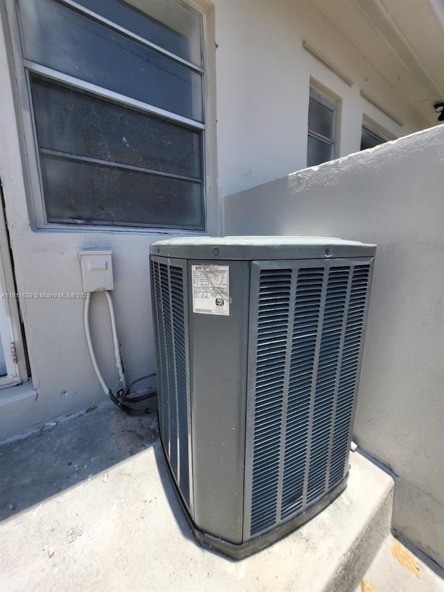 640-642 NW 77th St, Miami, FL 33150 - exterior view of cooling unit and stucco siding