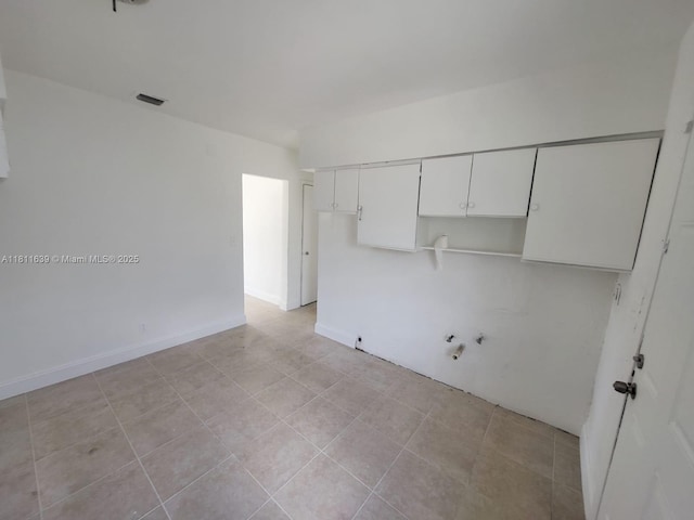 640-642 NW 77th St, Miami, FL 33150 - washroom with hookup for a washing machine and light tile patterned flooring