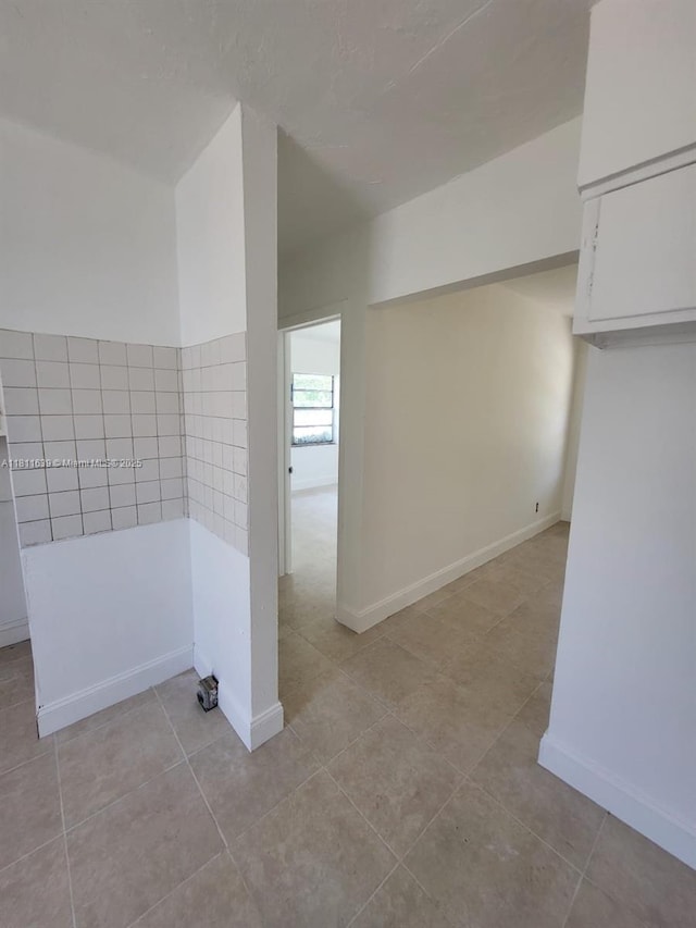 640-642 NW 77th St, Miami, FL 33150 - bathroom with tile patterned floors and baseboards