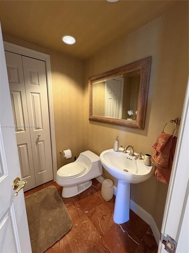 13627 Deering Bay Dr Unit 402, Coral Gables, FL 33158 - bathroom with toilet and baseboards