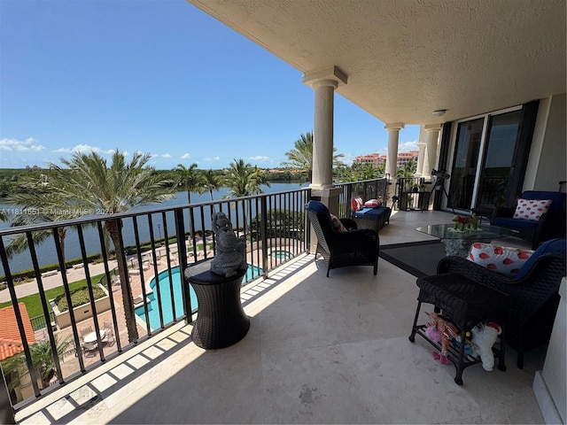 13627 Deering Bay Dr Unit 402, Coral Gables, FL 33158 - balcony with view of pool and a water view