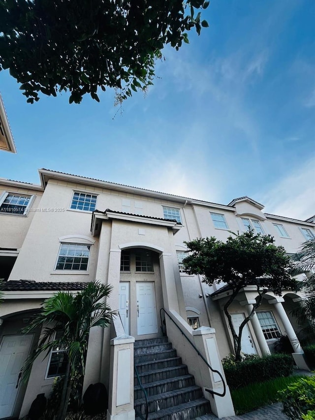 5670 NW 116th Ave Unit 212, Doral, FL 33178 - view of front of property featuring stucco siding