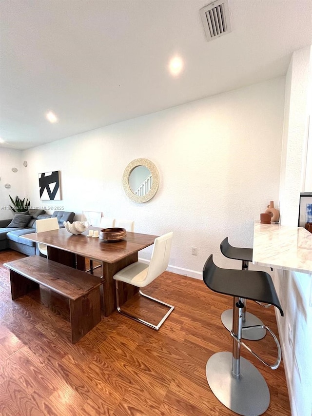 5670 NW 116th Ave Unit 212, Doral, FL 33178 - dining space with wood finished floors and baseboards