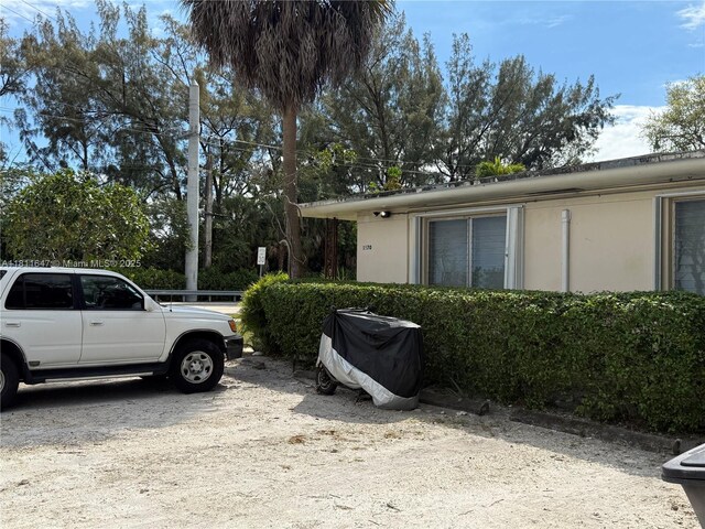 1570 NE 130th St, North Miami, FL 33161 - view of home's exterior featuring stucco siding