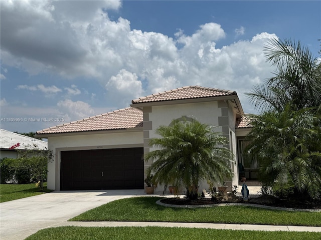 16306 SW 11th St, Pembroke Pines, FL 33027 - mediterranean / spanish house featuring a tile roof, an attached garage, concrete driveway, and stucco siding