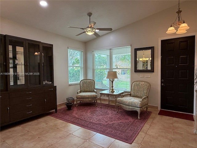16306 SW 11th St, Pembroke Pines, FL 33027 - living area featuring lofted ceiling, a ceiling fan, baseboards, and light tile patterned floors