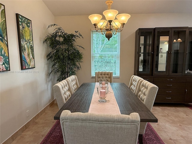 16306 SW 11th St, Pembroke Pines, FL 33027 - dining room with a chandelier, light tile patterned floors, and baseboards