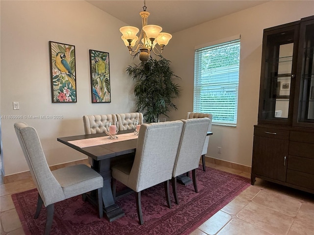 16306 SW 11th St, Pembroke Pines, FL 33027 - dining area with a chandelier, light tile patterned flooring, and baseboards