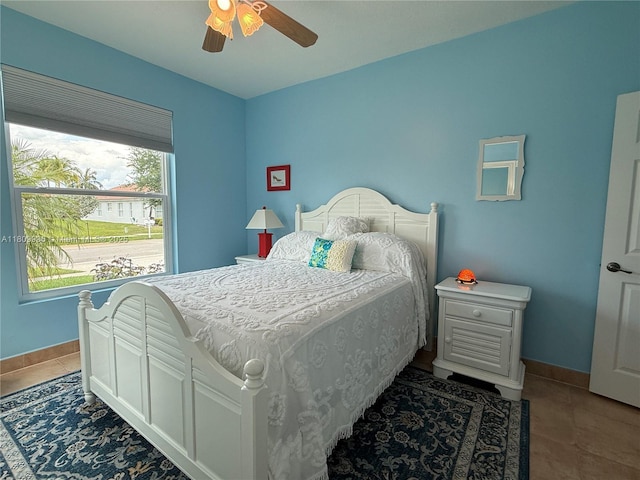 16306 SW 11th St, Pembroke Pines, FL 33027 - tiled bedroom featuring baseboards and a ceiling fan
