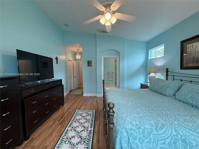 16306 SW 11th St, Pembroke Pines, FL 33027 - bedroom featuring wood finished floors, baseboards, ceiling fan, and connected bathroom