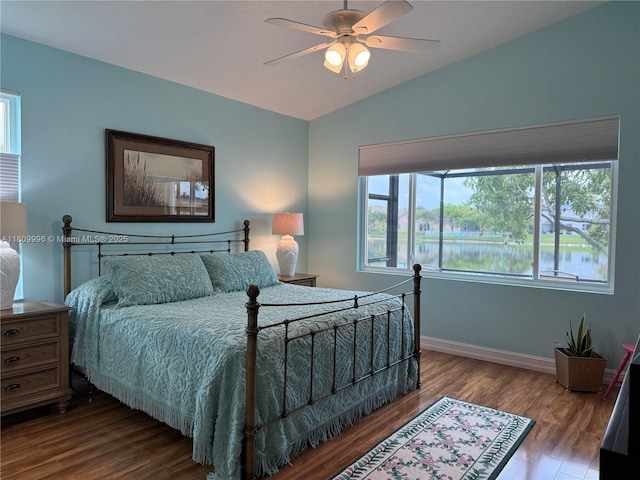 16306 SW 11th St, Pembroke Pines, FL 33027 - bedroom with lofted ceiling, baseboards, wood finished floors, ceiling fan, and a water view
