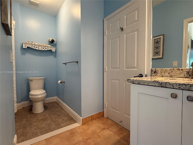 16306 SW 11th St, Pembroke Pines, FL 33027 - bathroom featuring vanity, toilet, tile patterned flooring, and baseboards