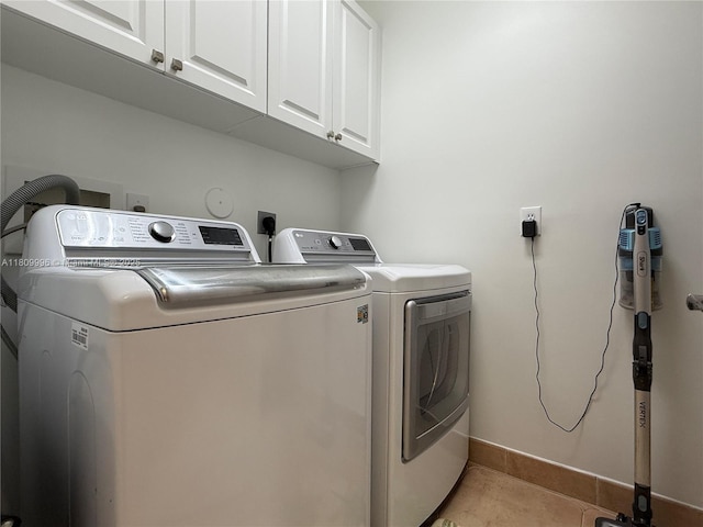 16306 SW 11th St, Pembroke Pines, FL 33027 - laundry room with separate washer and dryer, cabinet space, baseboards, and light tile patterned floors