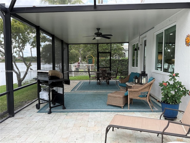 16306 SW 11th St, Pembroke Pines, FL 33027 - sunroom featuring ceiling fan, a water view, plenty of natural light, and a wall of windows
