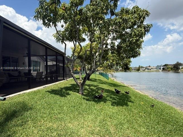 16306 SW 11th St, Pembroke Pines, FL 33027 - view of grassy yard with a water view