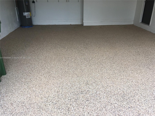 16306 SW 11th St, Pembroke Pines, FL 33027 - unfurnished room with electric water heater and speckled floor