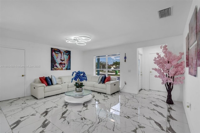 12351 NW 29th Mnr, Sunrise, FL 33323 - living room with baseboards and marble finish flooring