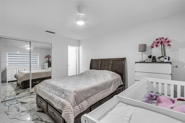 12351 NW 29th Mnr, Sunrise, FL 33323 - bedroom with light marble finish flooring and a closet