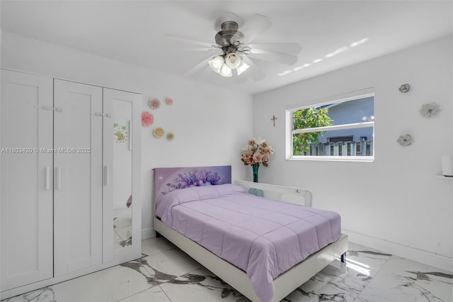 12351 NW 29th Mnr, Sunrise, FL 33323 - bedroom featuring light marble finish flooring, baseboards, and a ceiling fan