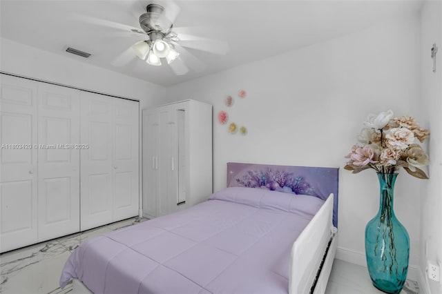 12351 NW 29th Mnr, Sunrise, FL 33323 - bedroom featuring marble look tiles, a closet, and ceiling fan