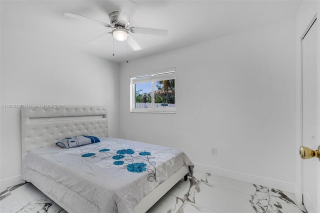 12351 NW 29th Mnr, Sunrise, FL 33323 - bedroom with marble finish floors, baseboards, and a ceiling fan