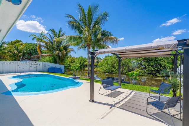 12351 NW 29th Mnr, Sunrise, FL 33323 - view of swimming pool with a fenced backyard and a patio
